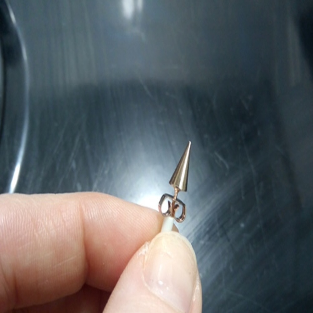 SOLD Rose gold pointed studs